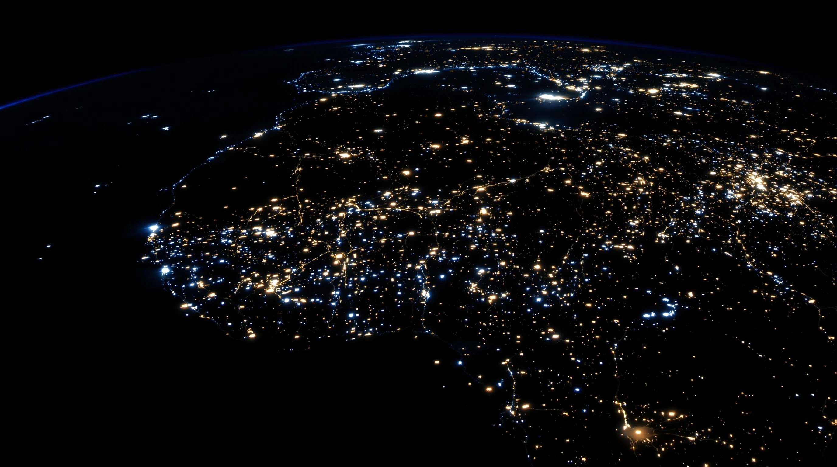 Earth from orbit at night showing southern Africa illuminated by city lights